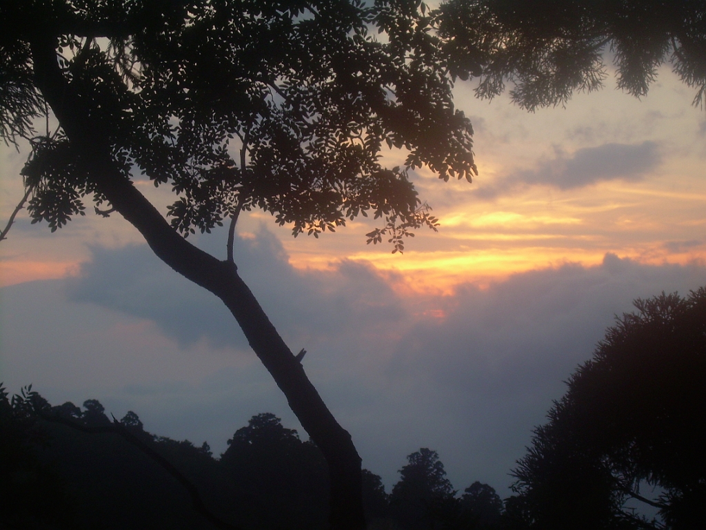 dscn0747.jpg - The sun sets beyond the temple mountain.