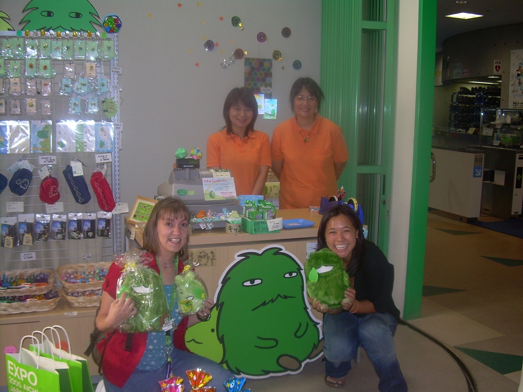 dscn0804.jpg - And they still sell souvenirs.  Note the Expo bags in the lower left corner.  When I told these ladies that I had worked at the US Pavilion and was now back to visit, they got out some of the few authentic 2005 Expo bags that they had left, and put all the souvenirs I bought (and the ones they gave me for free!) in those bags.  It was quite fun taking them on the subway later, and watching people give us quizzical looks. "Um, you guys are two years late....")