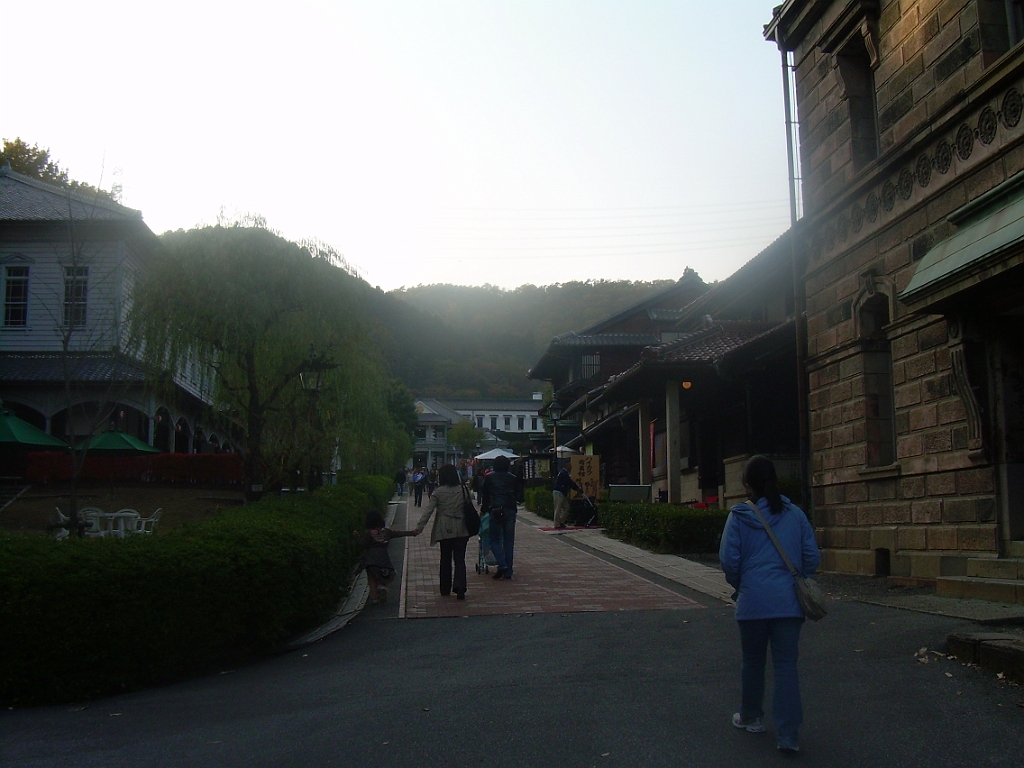 dscn0878.jpg - Myra walks ahead of us into the small town center area.