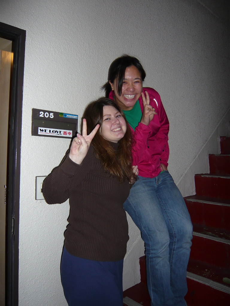 p1000001.jpg - This is the very first picture I got with my brand new digital camera (after my other one got broken at the Snow Festival).  It's of Katie J and Myra, my neighbors in the High Life Morii apartment complex.