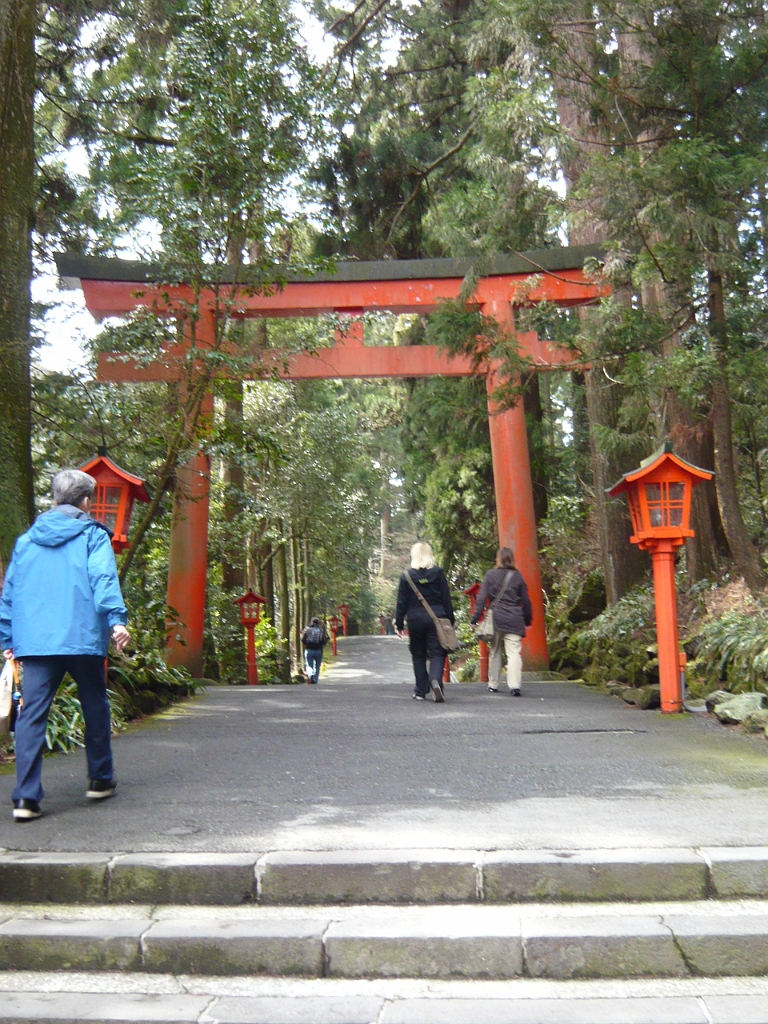 p1000064.jpg - Jamie and Megan proceed through the torii.