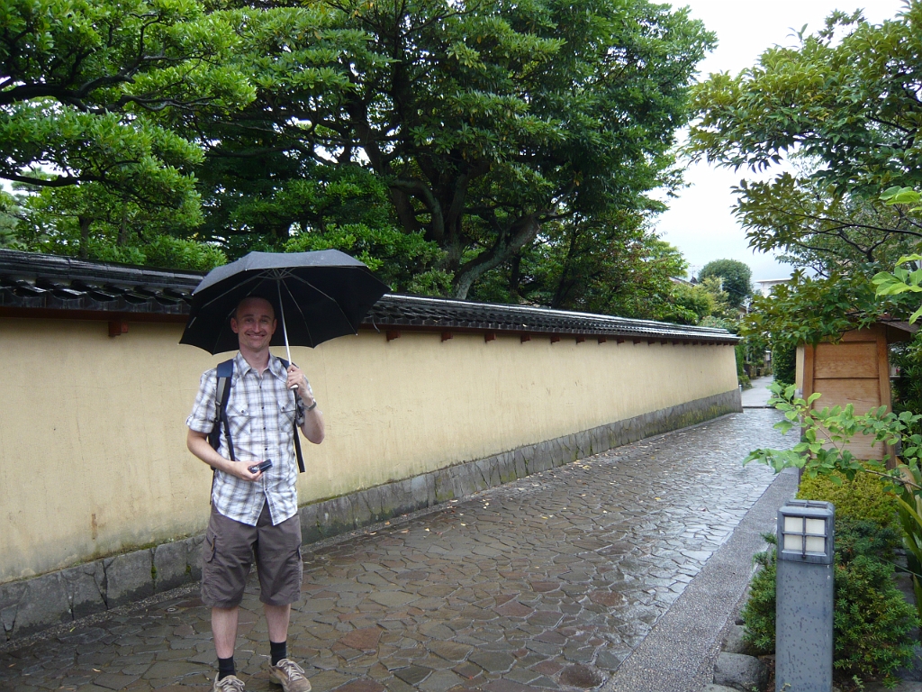 p1010809.jpg - The rain hasn't dampened Andrew's spirits!