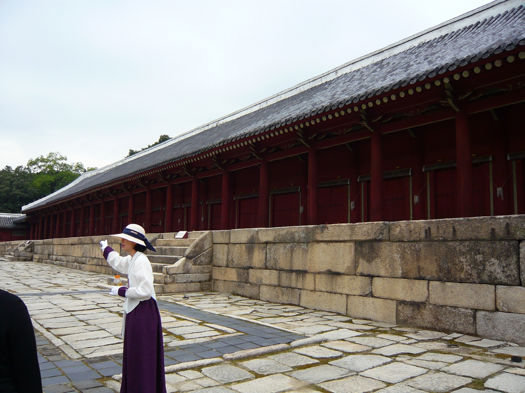 p1010922.jpg - The next day, we went to visit ancient Korean castles.  We got to join this tour, given by a very knowledgeable lady in traditional Korean dress, for free.