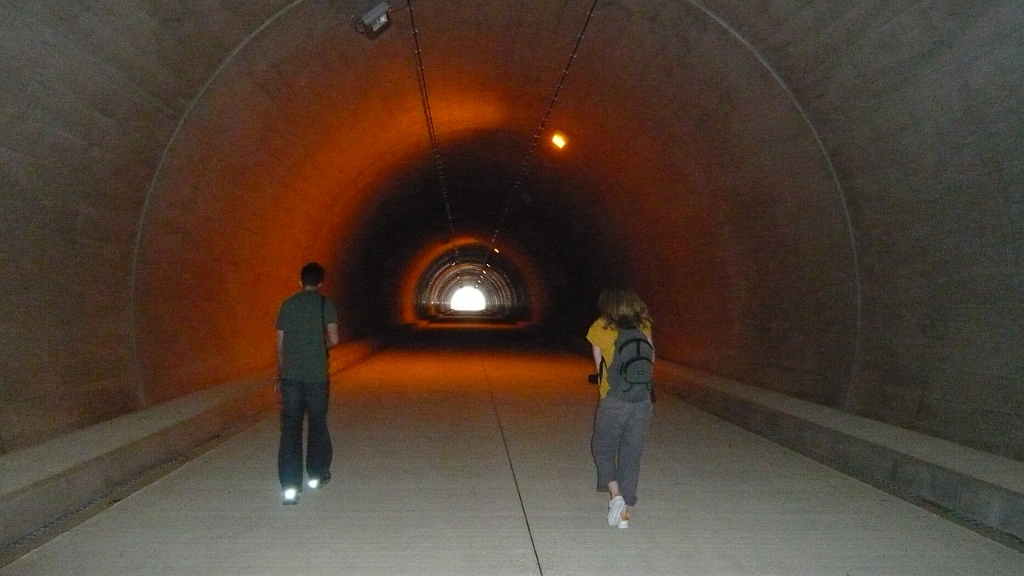 p1020518.jpg - As we continued our ghost town hunt, we found this tunnel built in the middle of nowhere, going to nowhere, and closed off (to cars anyway) with barricades.