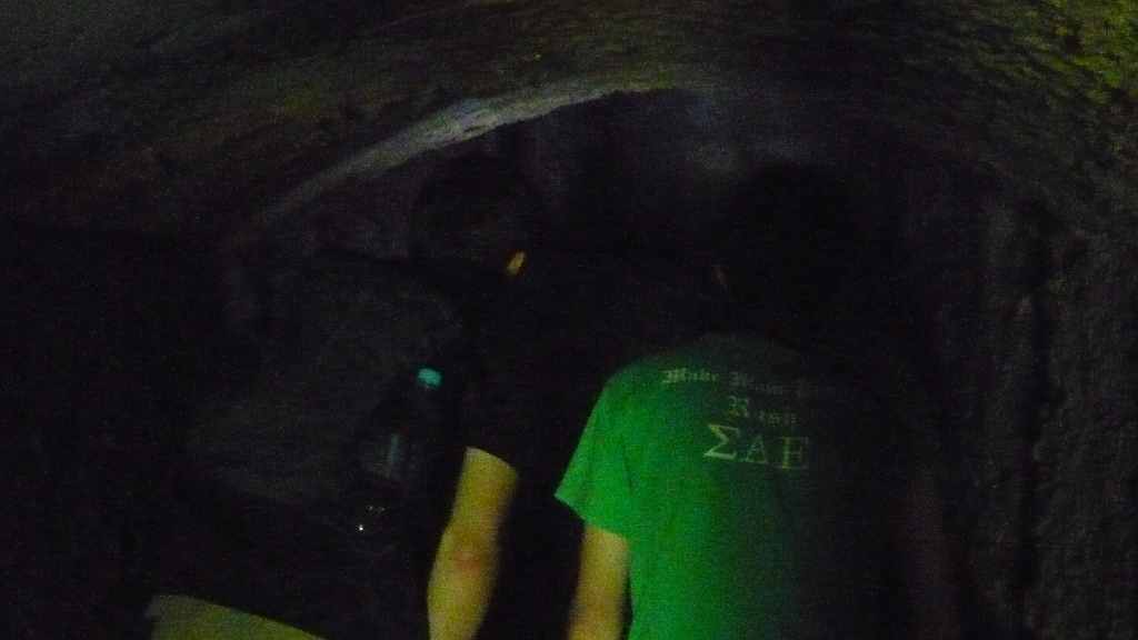 p1020712.jpg - James and Jeremiah investigate inside a mine tunnel.