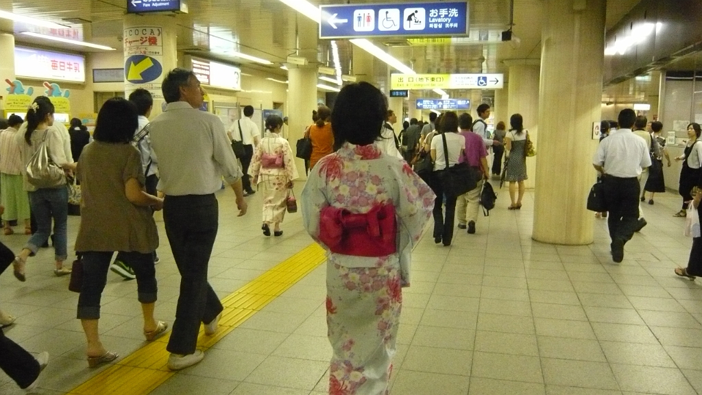 P1020748.JPG - Toward the end of my time in Japan, I went to the Gion Matsuri in Kyoto, one of the most famous festivals in Japan.  In this underground section of Kyoto Station, you could see people dressed in yukata, the traditional festival garb of Japan.