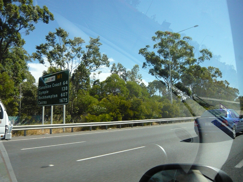 p1010234.jpg - I was the navigator.  According to the sign we are 1,675 km from Cairns.  Queensland is a big state.