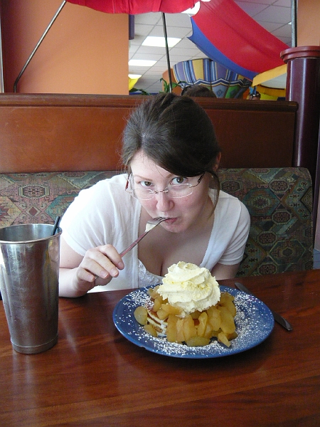 p1010416.jpg - Katie was very, very happy about her pancakes with apples and ice cream, and her milk shake.