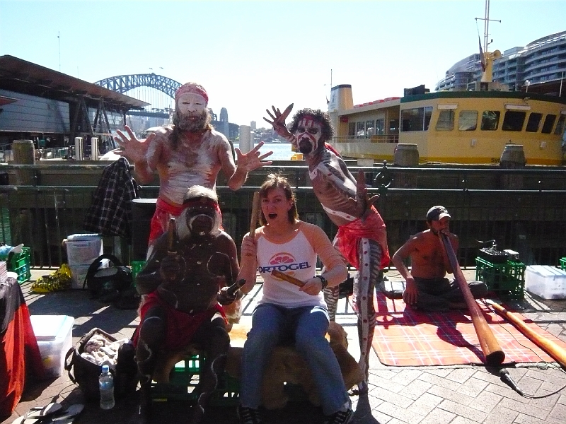 p1010533.jpg - These Aboriginies were sitting in Circular Quay catching tourists.  (Quite determinedly, really -- normally I don't go for this sort of thing.  I'm not sure how to feel about it.)