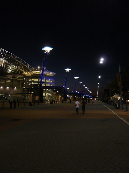 p1010655.jpg - The blue torches that line this street each have the name of an Olympic city at its base.  Very cool!