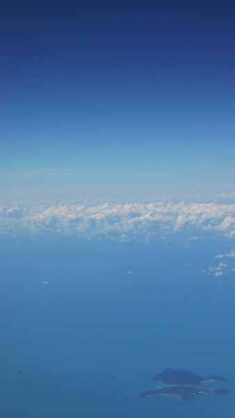 p1010694.jpg - More Coral Sea islands.  I like seeing the clouds above them too.  When you read my novel, you will too. ;)