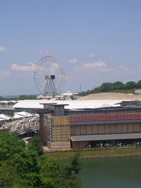 dscn0492.jpg - In the foreground you an see one of the Japanese pavilions, and in the background is the obligatory giant Ferris wheel.  (Japan loves Ferris wheels, and since the first one was built for the 1893 Exposition in Chicago, it's natural that they put one here.)