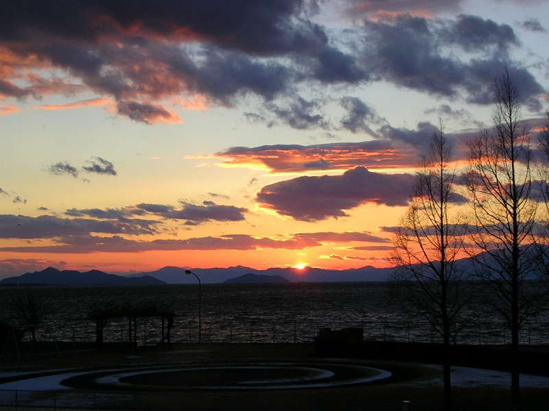 lakeview04.jpg - A sunset over Lake Biwa.  This was the view from of our rooms at the Toyota company resort facility in Hikone, Shiga Prefecture where we stayed during our training.