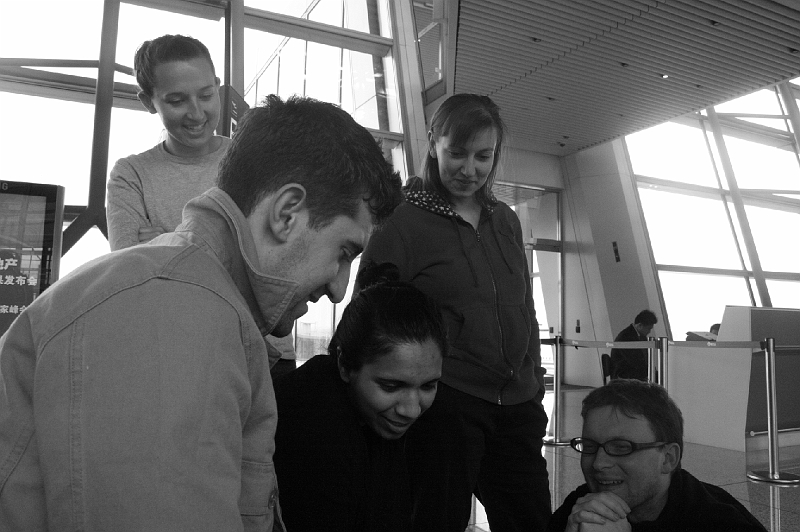 IMG_7491.JPG - A last shot of some of our tired but happy crew at the Beijing airport (courtesy of Nikki), before we split up for flights to Osaka, Tokyo, and Nagoya.