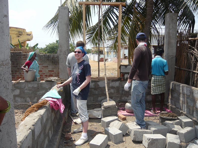 p1020146.jpg - Here I am actually doing some work, with Greg and some of the villagers.