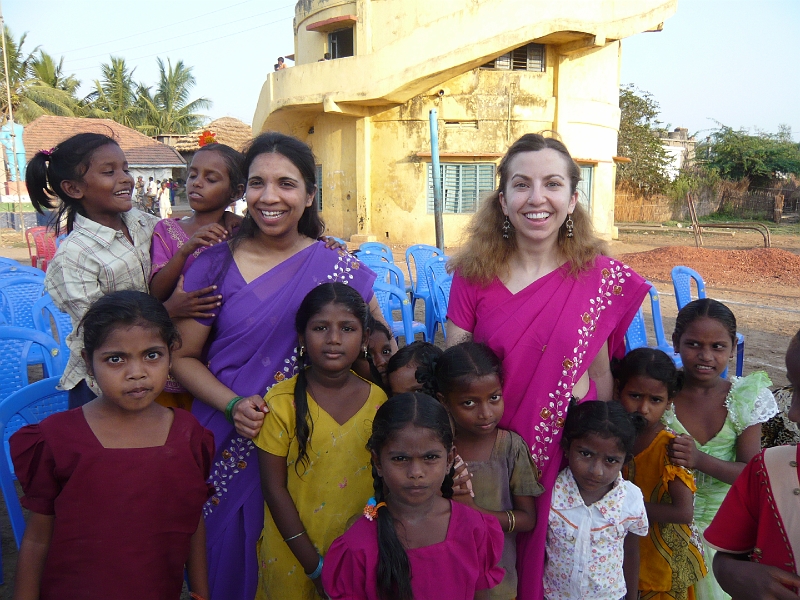 p1020193.jpg - Pam and Annie in their saris, with lots of the kids.